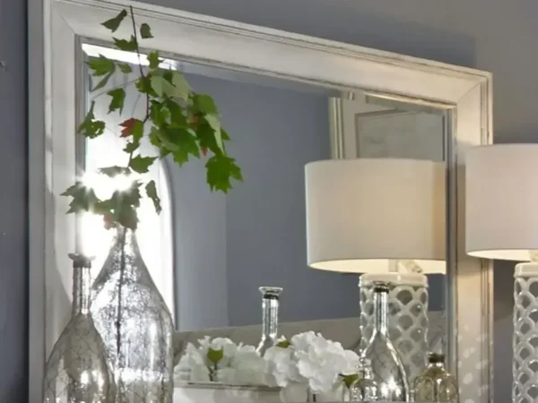 Decorative mirror with lamps and vases