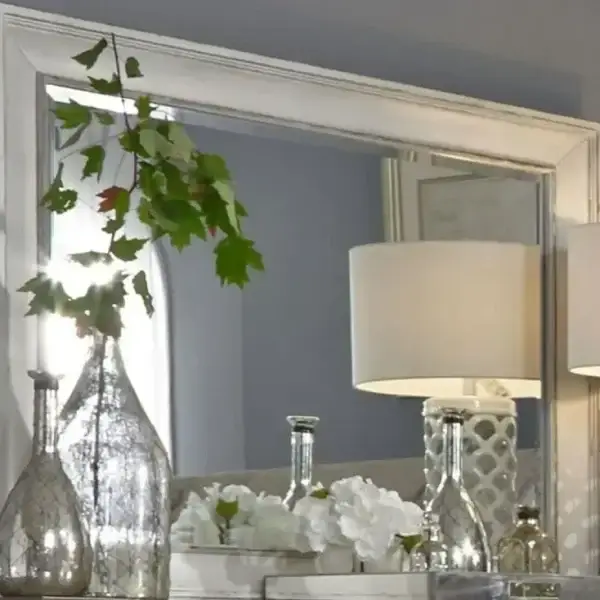 Decorative mirror with lamps and vases