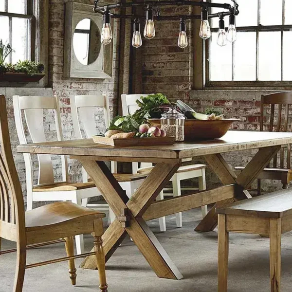 Rustic dining room with wooden table and chairs.