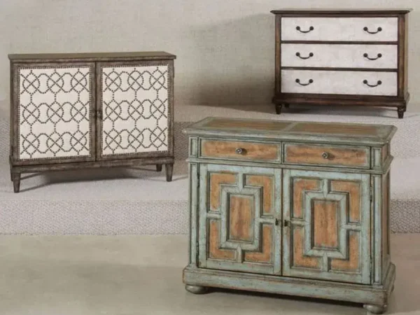 Three vintage-style wooden cabinets with unique designs.