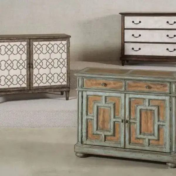 Three vintage-style wooden cabinets with unique designs.
