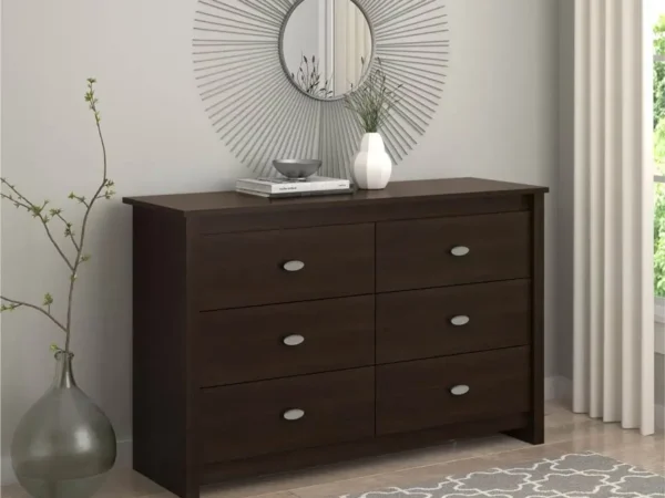 Modern dresser with decorative mirror in bedroom.