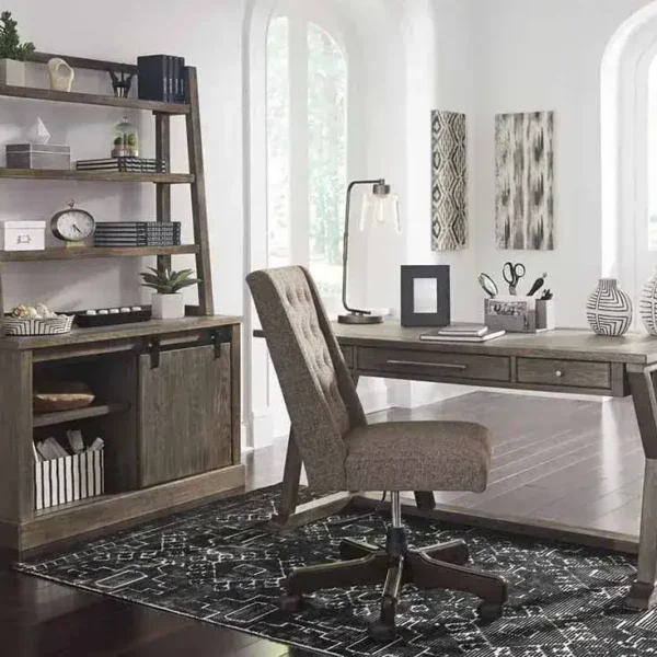 Modern home office with desk and bookshelf.