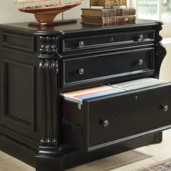 Black wooden file cabinet with open drawer