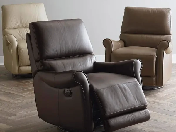 Three leather recliner chairs in various colors.