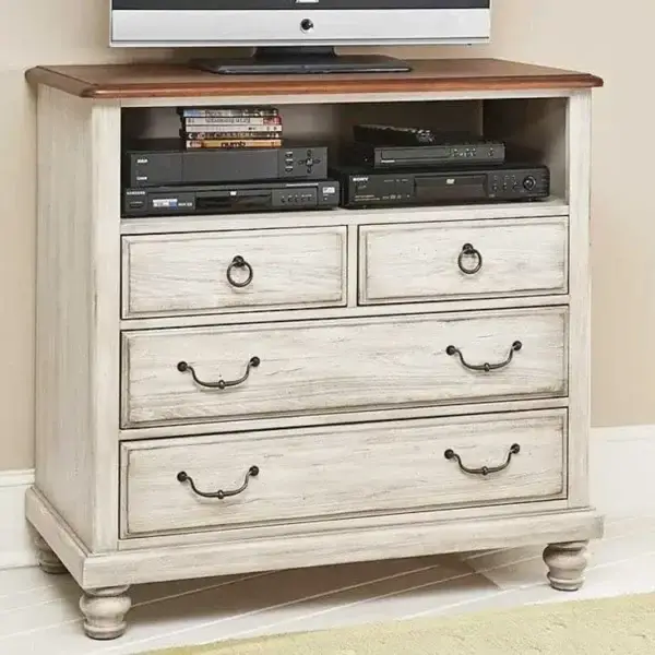 Vintage white dresser with TV and electronics