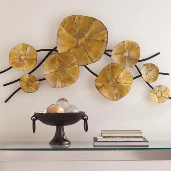 Yellow wall art with decorative bowl on table