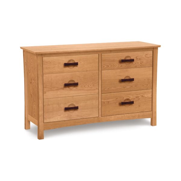 Six-drawer wooden dresser with dark wood handles on white background.