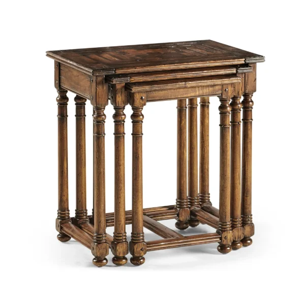 Rustic dark wood nesting tables with turned legs.