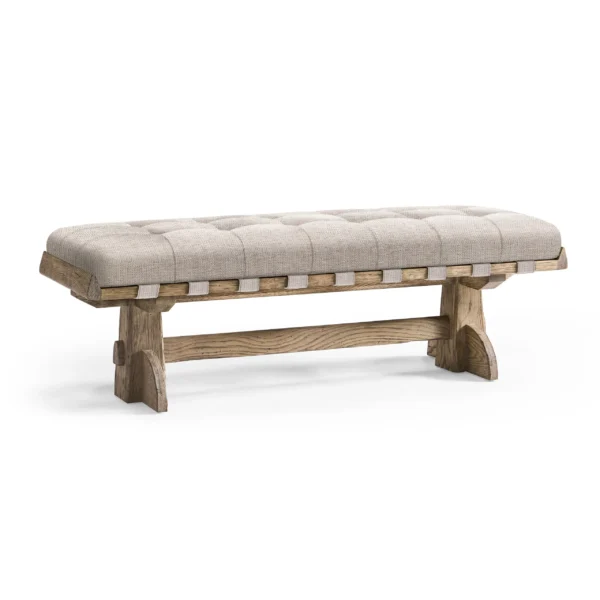 Rustic wooden bench with tufted grey upholstered cushion seat.