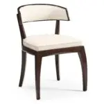Modern dark wood dining chair with cream leather upholstery.