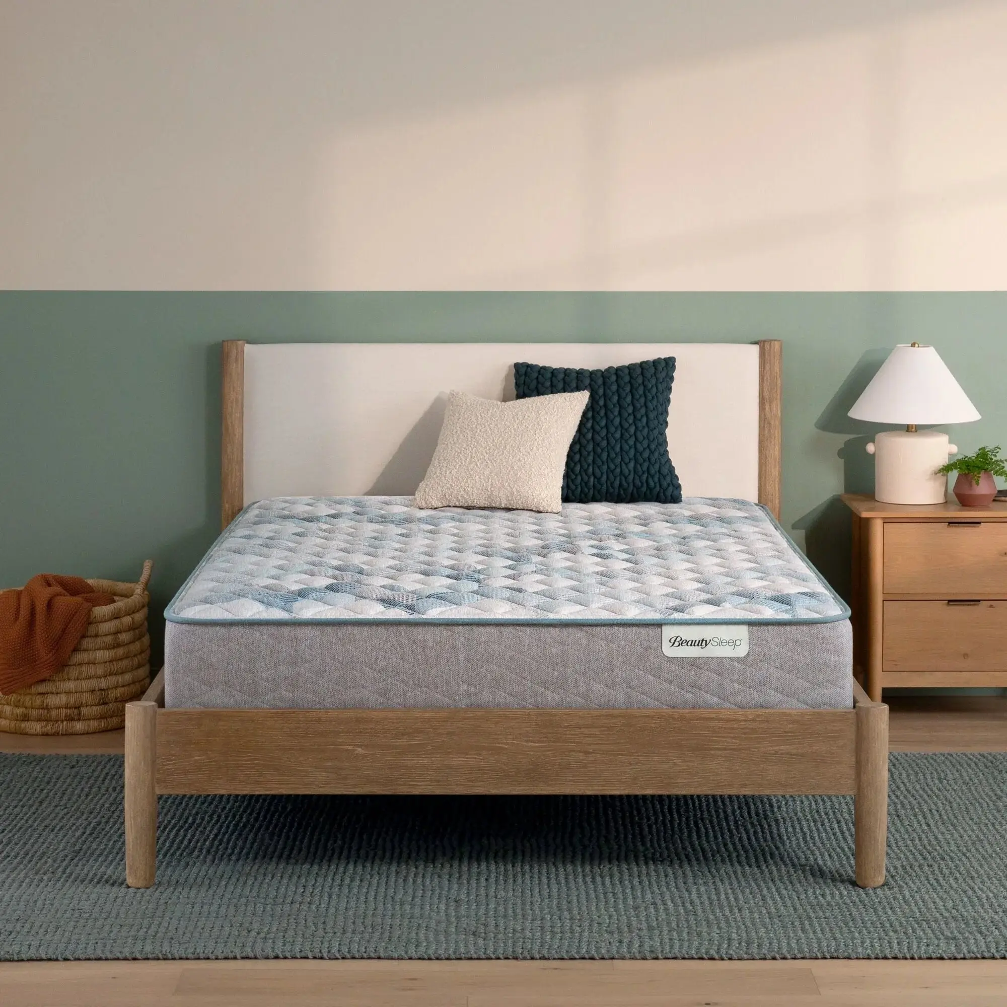 beautysleep dream weaver firm tight top mattress 12.5" BeautySleep mattress on a modern wooden bed frame.