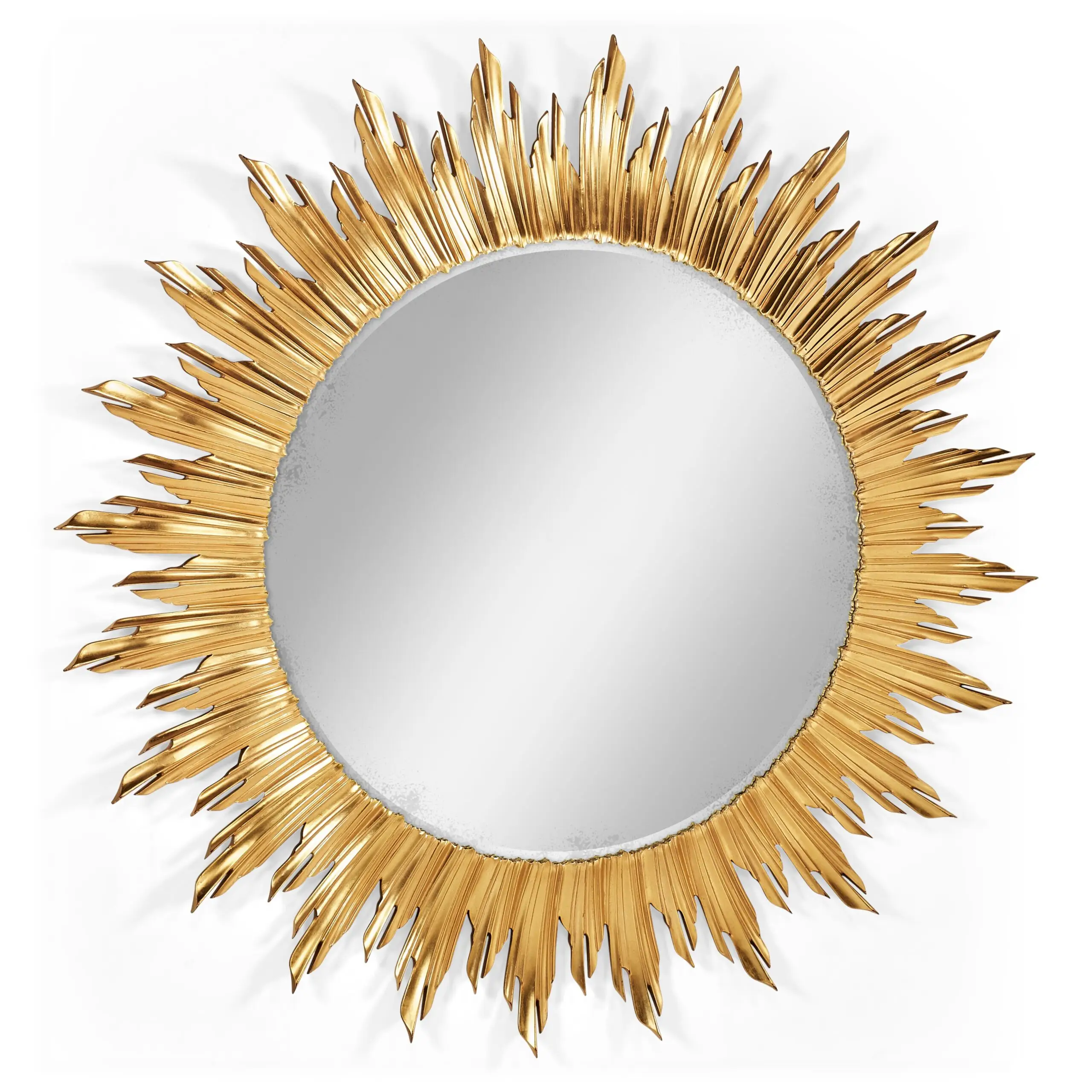 large gilded sunburst mirror Golden sunburst wall mirror with jagged rays.