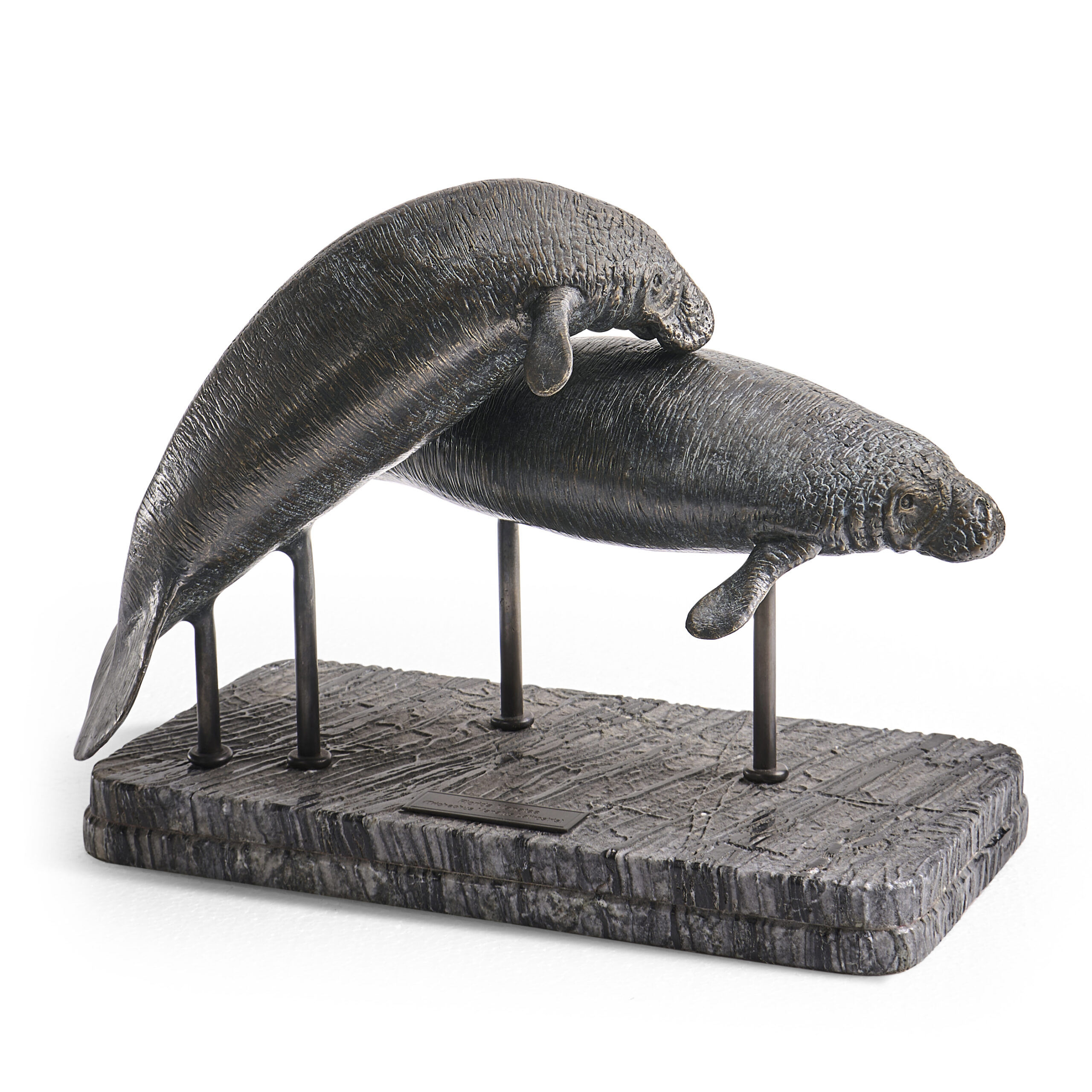 raised manatee bronze statue with marble base raised manatee bronze statue with marble base