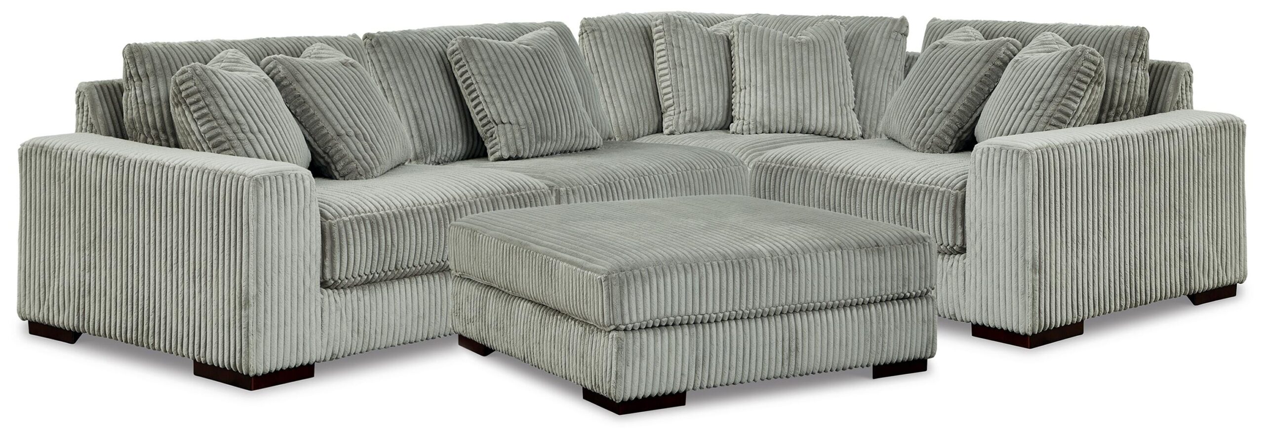 d1eef6f5adb3037e0c8ecbfea8a44987 Lindyn 4-Piece Sectional and Ottoman - Image 1