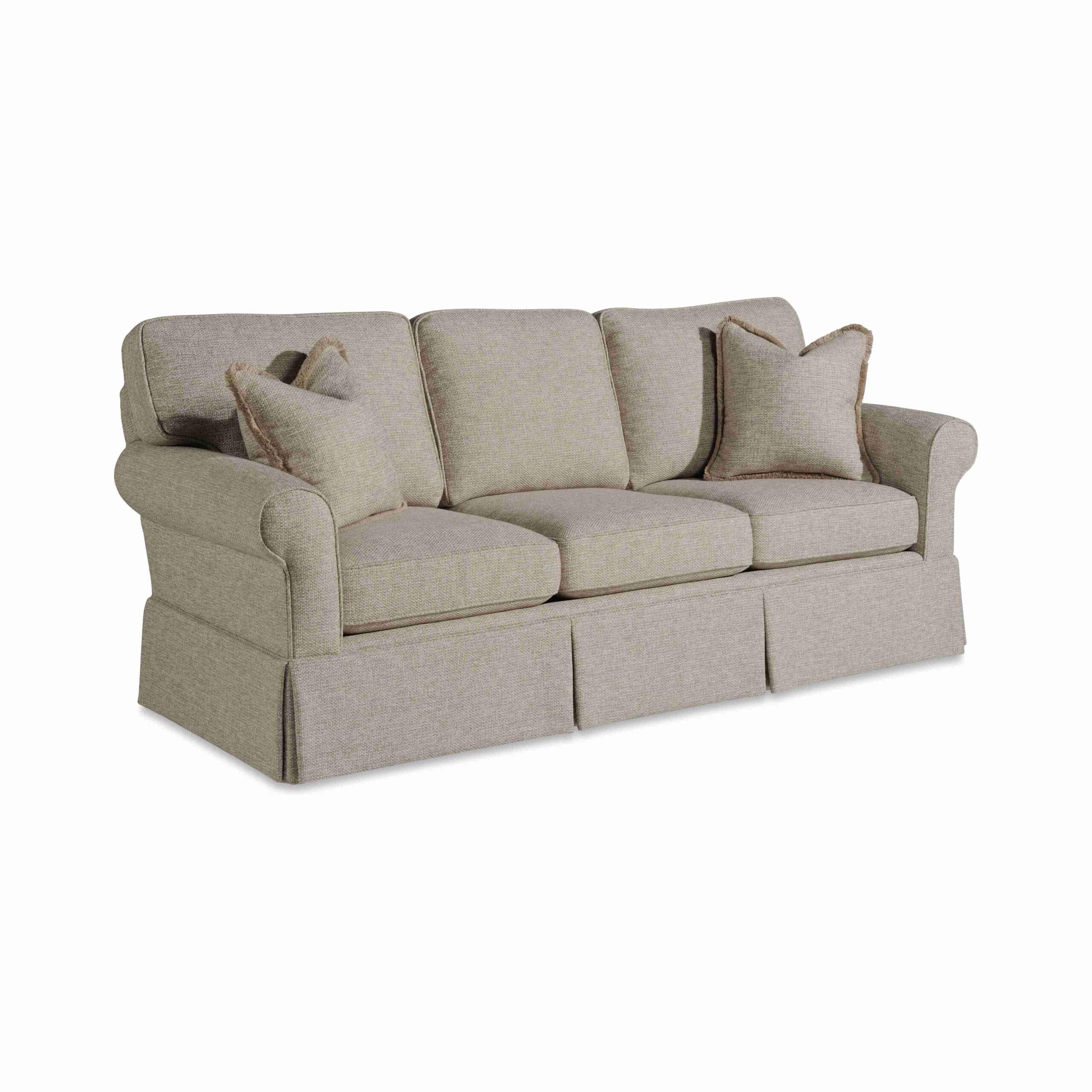 cozy creations "bitsy" sofa Classic beige three-seater sofa with rolled arms and skirt.