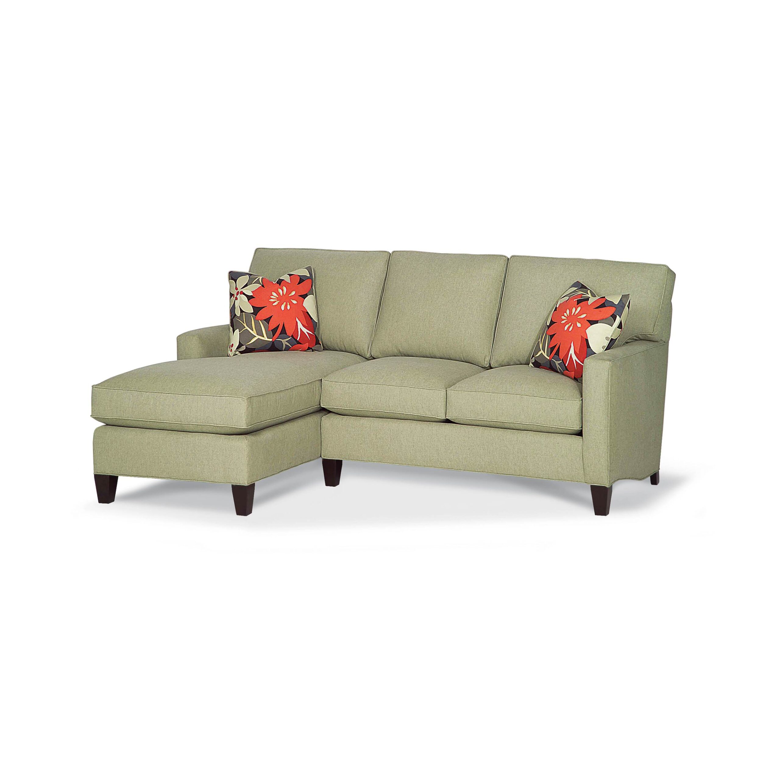 cozy creations sectional sofa Light green sectional sofa with floral accent pillows.