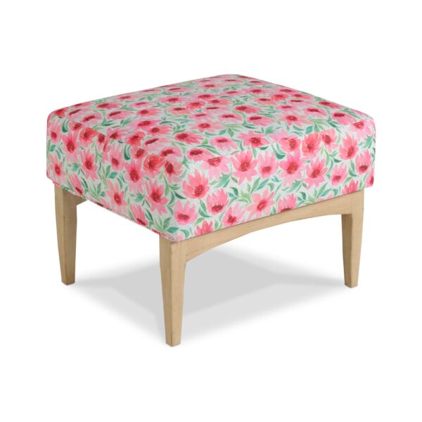 Floral print ottoman with light wood tapered legs.