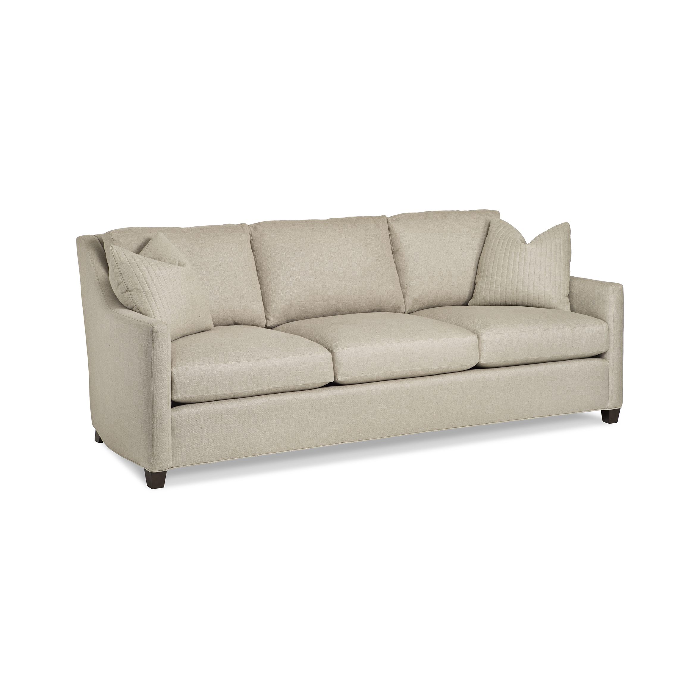 hudson sofa Beige three-seater sofa with two ribbed accent pillows.
