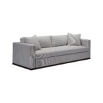 Modern light gray pinstriped sofa with matching throw pillows