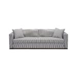 Modern grey pinstripe three-seater sofa with matching throw pillows.