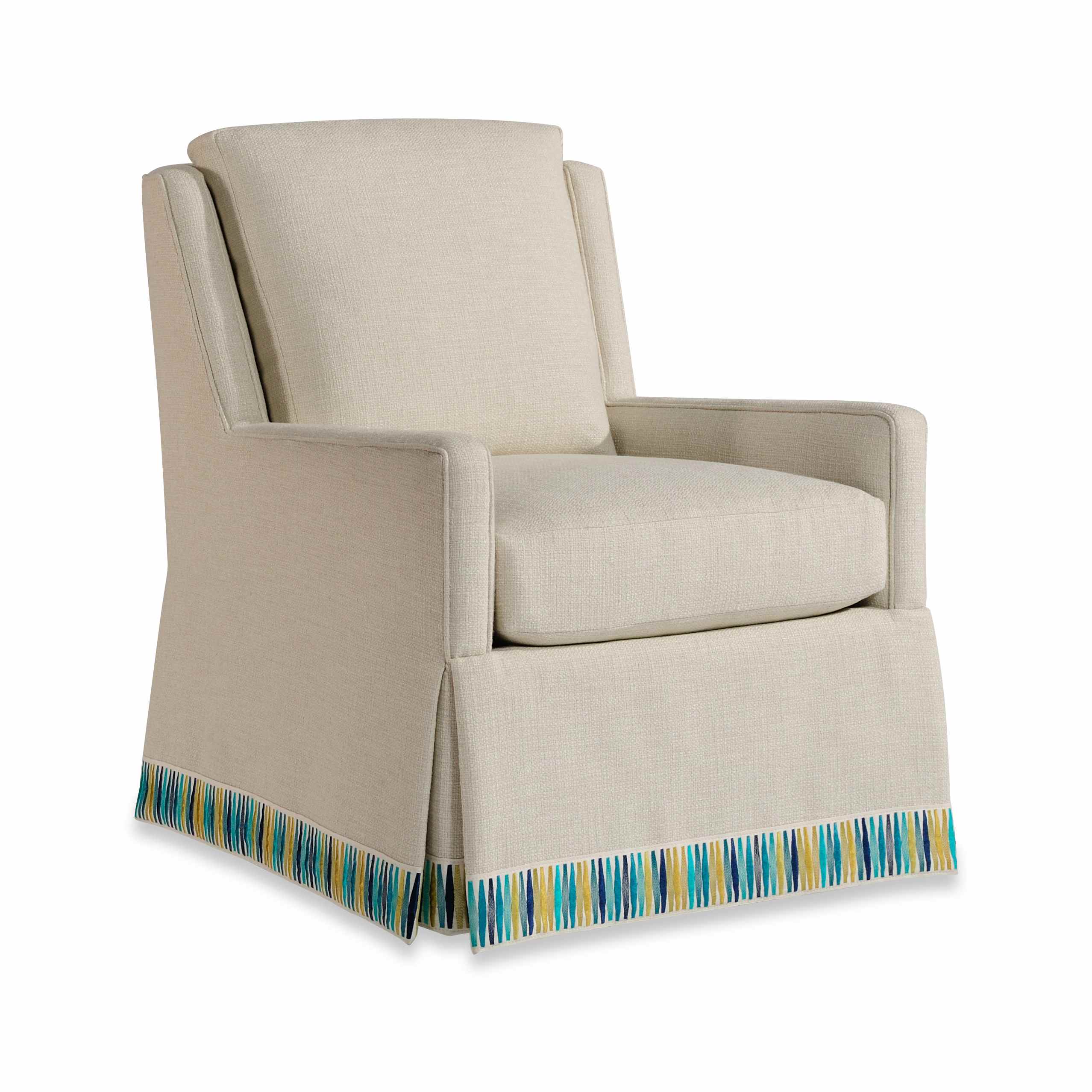 neel swivel chair Beige upholstered armchair with colorful patterned skirt border.