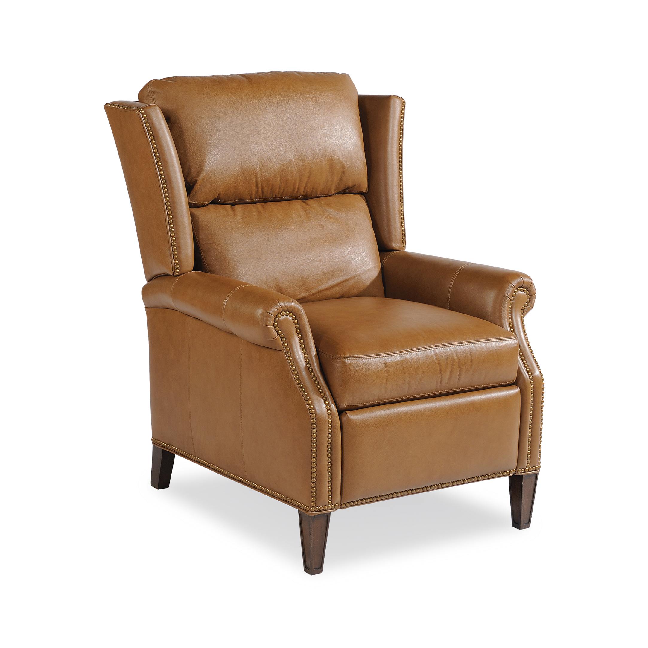 rowan leather reclining chair Tan leather wingback recliner with brass nailhead trim.