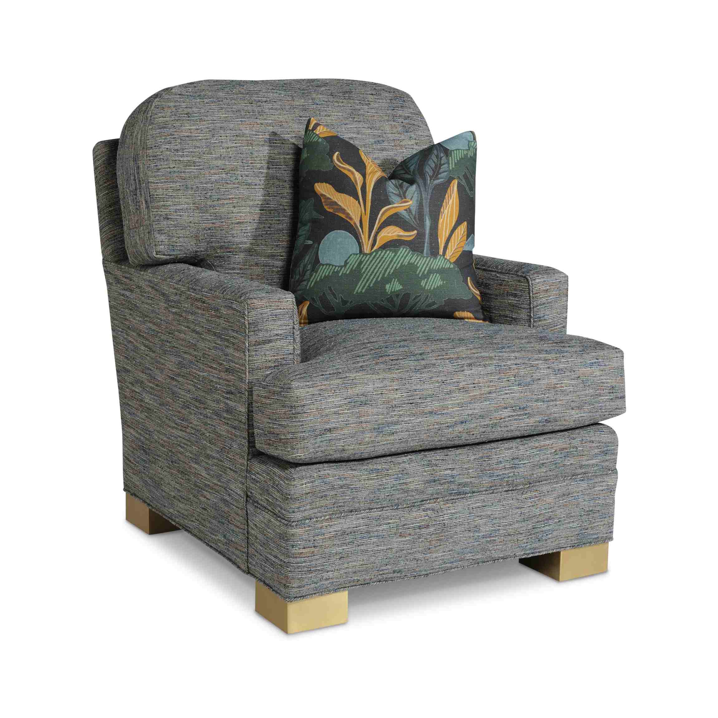 taylor made tall chair Gray textured armchair with a botanical print pillow.