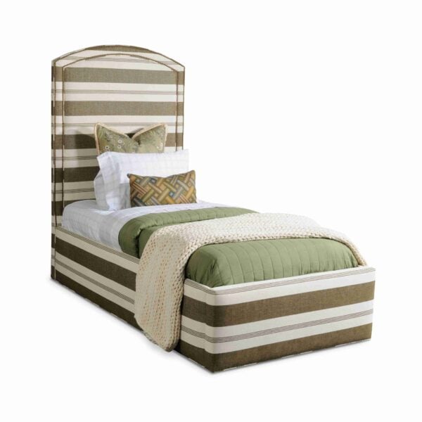 Striped upholstered twin bed with tall headboard and green bedding.