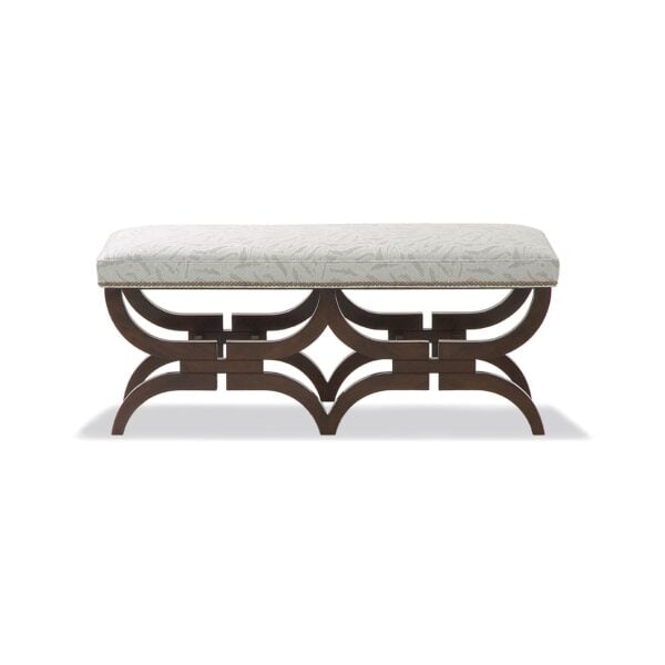 Upholstered bench with dark wood base and intricate curved legs.