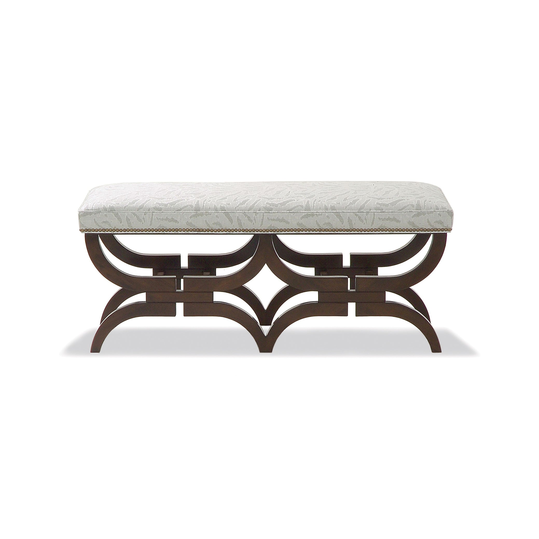 temperley bench Upholstered bench with dark wood base and intricate curved legs.