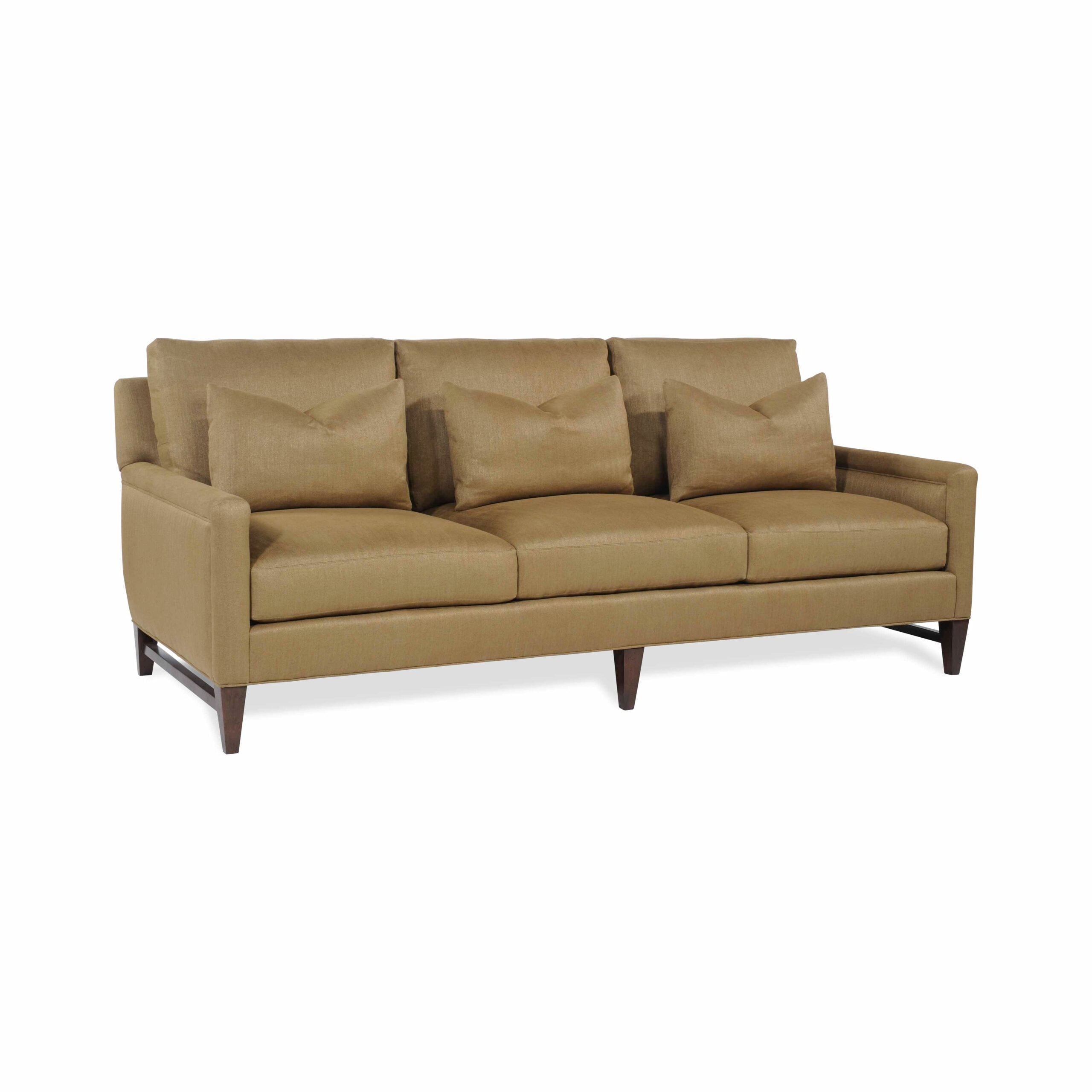 wagoner sofa Tan three-seater sofa with three matching throw pillows.