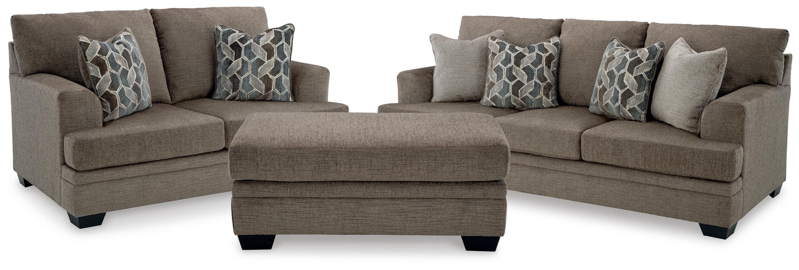 9c8143dcd0baaa7f1388b875363a4d94 Stonemeade Sofa, Loveseat and Ottoman - Image 1