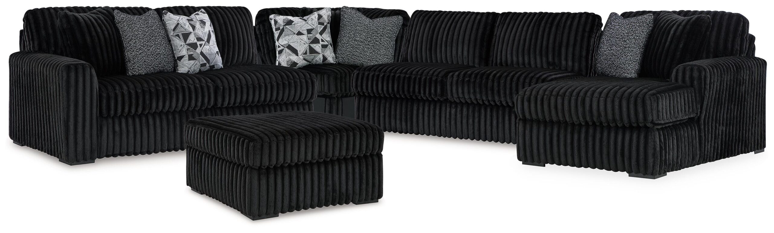 cdc30b43f8768b42f08de8c508240b46 Midnight-Madness 4-Piece Sectional and Oversized Accent Ottoman - Image 1