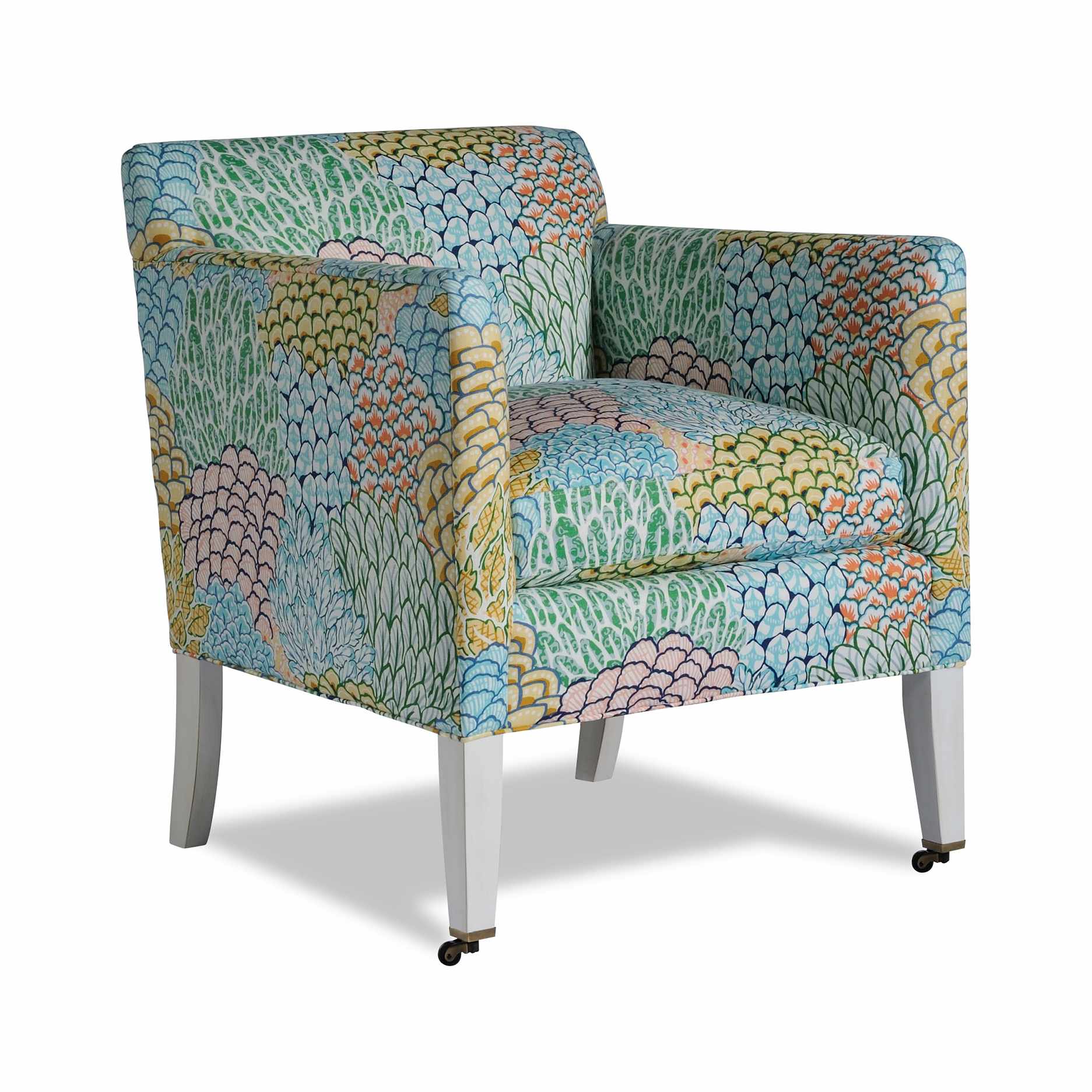 cline chair Colorful patterned armchair with white legs and front casters.