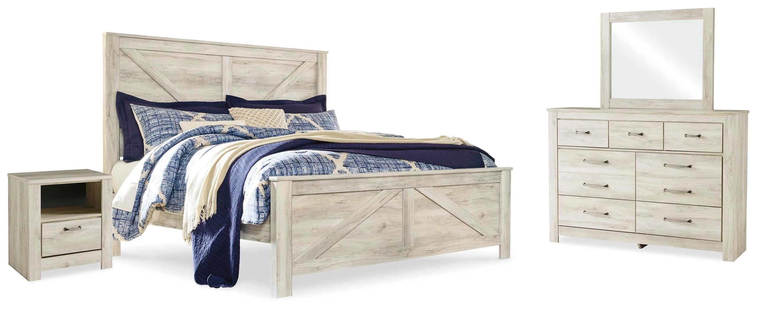 f566eb1fc111098c71cac673ed727a40 Bellaby King Crossbuck Panel Bed, Dresser, Mirror, and Nightstand - Image 1