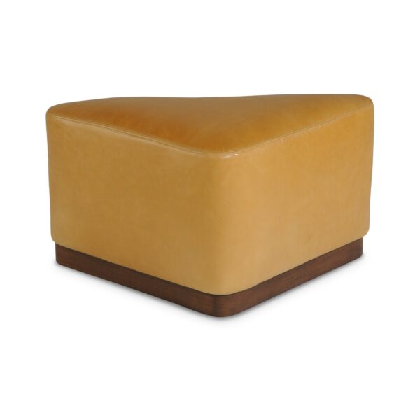 Triangular tan leather ottoman with a dark wood base.