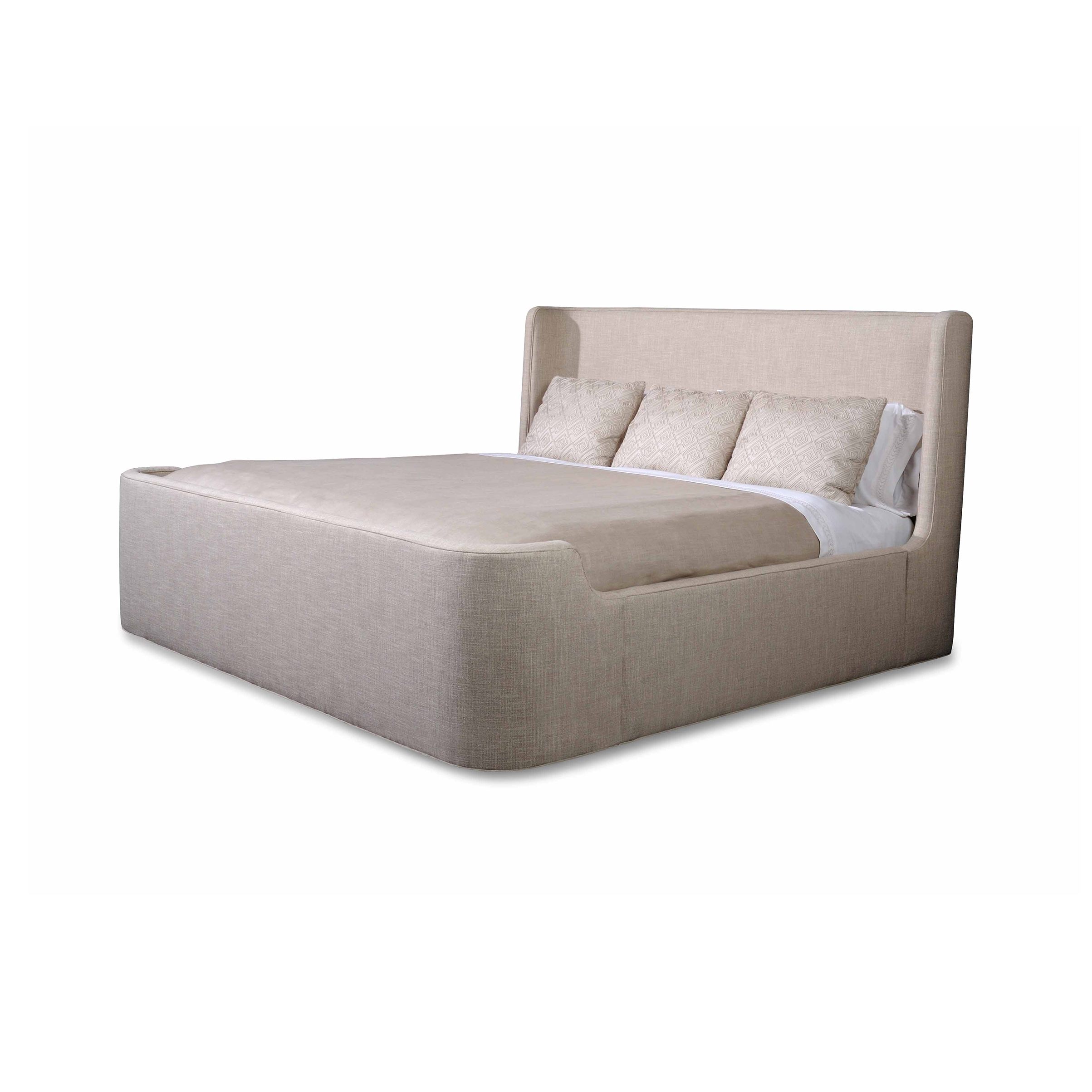 riley king bed Upholstered beige bed frame with a high wingback headboard.