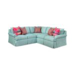 Light blue l-shaped sectional sofa with colorful accent pillows.